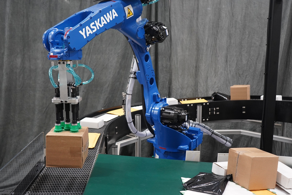 Flexible, High-Speed Robotic Parcel Induction for Fast, Accurate Order Fulfillment