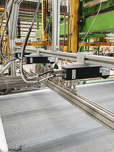 A linear slide on the robot arm ensures it can reach every position on the shelves, and the end-of-arm-tooling incorporates a gripper from SCHUNK Inc. and additional sensors to ensure handling is gentle and without collisions. Credit: ABB.