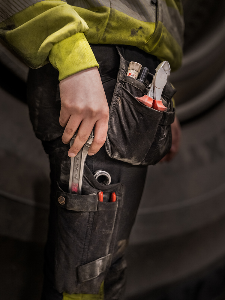 Tools in workers pocket