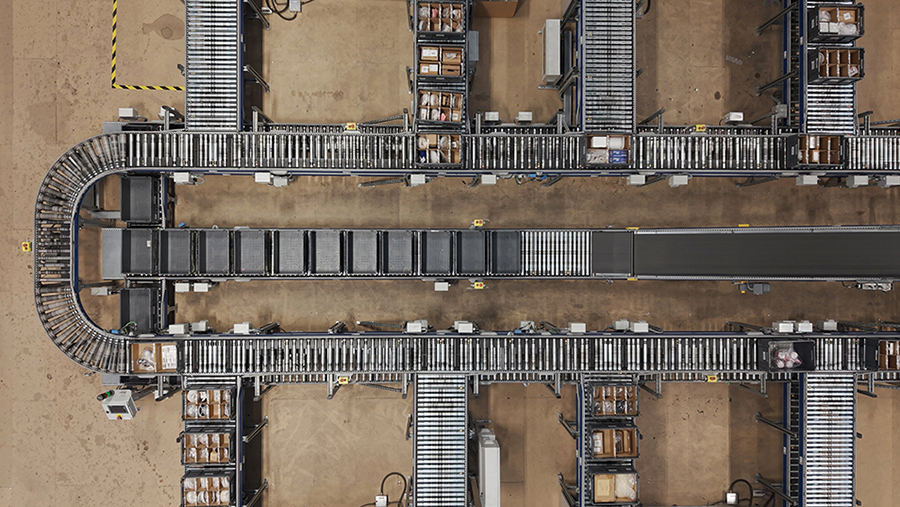 An industrial assembly line shown from above.