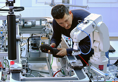 man working on robot