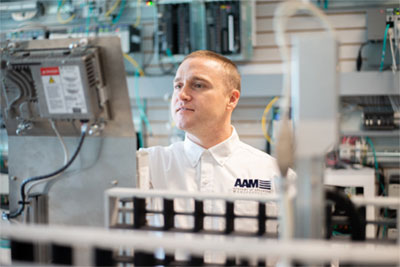 Caption: Academy of Advanced Manufacturing student troubleshoots a network device. Credit: Rockwell Automation 