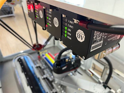 ArmorKinetix distributed servo drives control motors on a delta robot. Based on SiC technology, the drives experience less power loss and less need for heat dissipation.  Source: Rockwell Automation