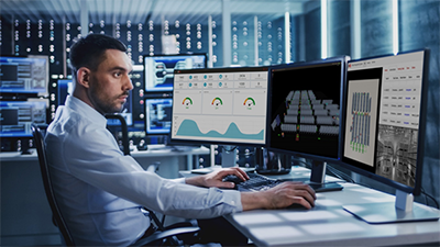 an operator in inVia Robotics' operations center monitors a robot fleet using a real-time simulation of the customer facility