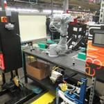 Automotive Glass Priming with Collaborative Robots