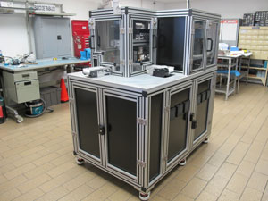 View from the back of the Final Vision Station. Both the “pass” and the “rework” conveyor (the latter going to the back of the equipment) can be seen.