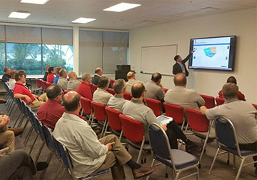 Dr. Zhenhua Huang, General Manager of Americas at Coherix, gives a presentation on in-line robust 3D bead inspection