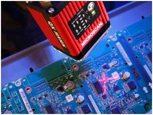 A high-performance imager uses special algorithms to read codes with limited quiet zones, such as a Data Matrix on this crowded PCB.