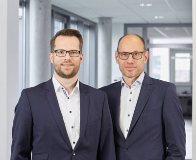 Daniel Seiler (Managing Director of IDS) and Jürgen Hartmann (Founder, Owner, and Managing Director of IDS)
