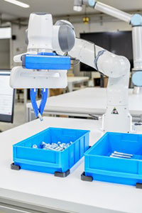 Robot gripping screws