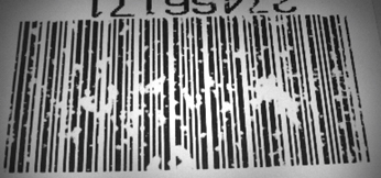 Figure 3: The encoded data of this linear barcode may be accurate and properly structured, but inconsistency of the distribution of ink by the printing method may render the code illegible.