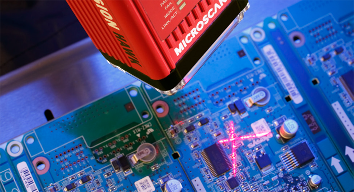 Figure 9: A barcode reader decodes a symbol on a PCB to acquire part data and log the part as it enters the assembly process.