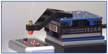 NEW mini XY high speed positioning stage  shown in optics scan and alignment application