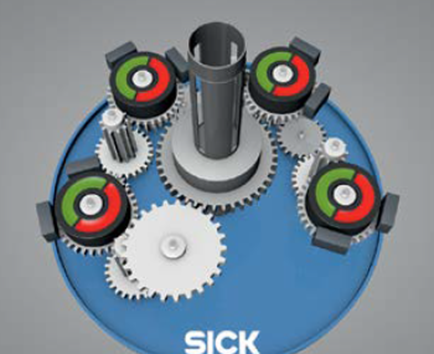 A multi-turn absolute encoder uses a simple gearing mechanism to tie the motion of the primary feedback disc with the secondary disc that monitors turns. (Courtesy of SICK).
