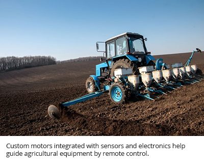 Custom motors integrated with sensors and electronics help guide agricultural equipment by remote control.