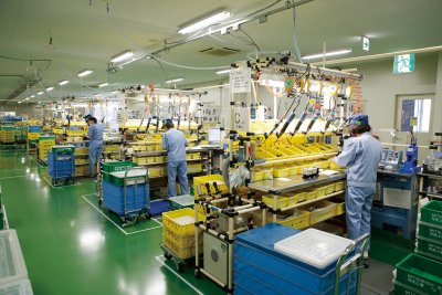 The introduction of a human element to previously automated  assembly lines has helped the Kani factory react to changes in product  demand. 