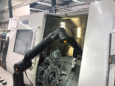 Kassow Robots partner Swisscobots uses a cobot in a CNC machine tending application.