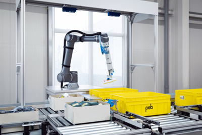 Featuring two Ensenso 3D cameras from IDS, the “autopick” robot picks unknown products from bulk materials and places them in a target container at speeds of up to 500 parts per hour. Image: psb intralogistics GmbH, Germany