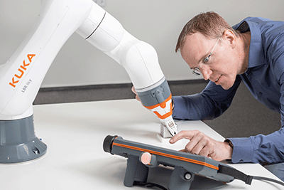 New collaborative robot is first in line for a fledgling ecosystem of hardware and software that will bring plug-and-play ease to robotic material handling and machine tending applications. (Courtesy of KUKA Robotics)