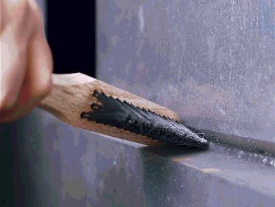 cleaning with wooden brush