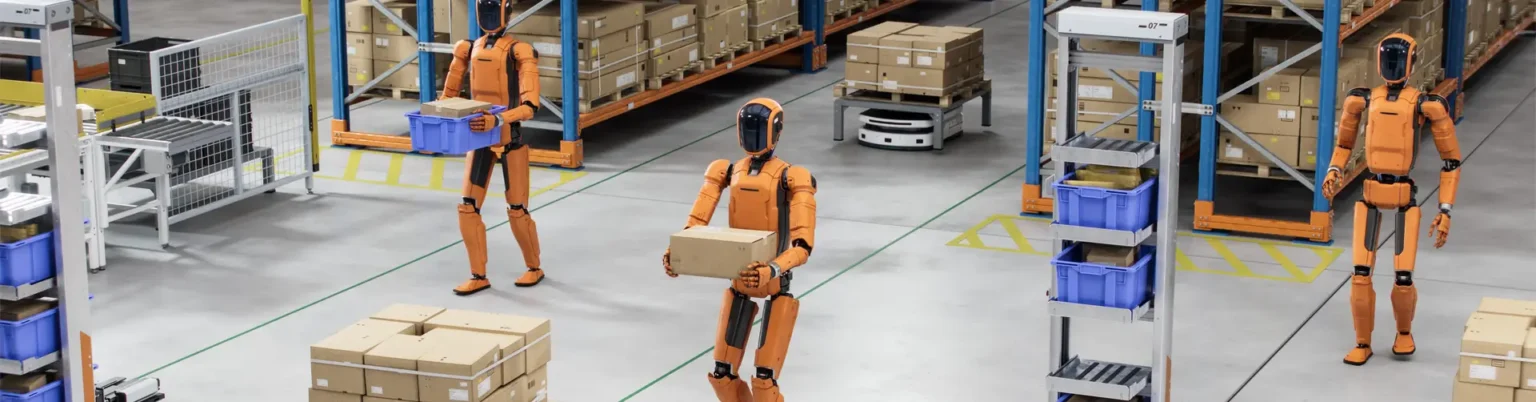 humanoid robots carrying boxes in a warehouse
