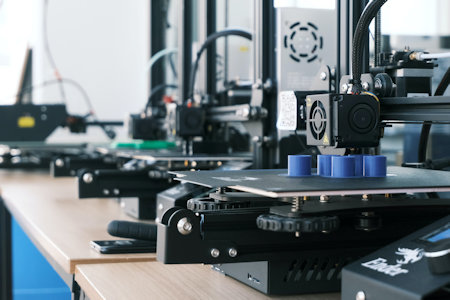 3D printing with optical components