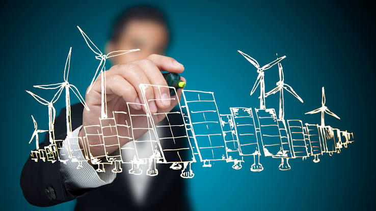 person drawing windmills
