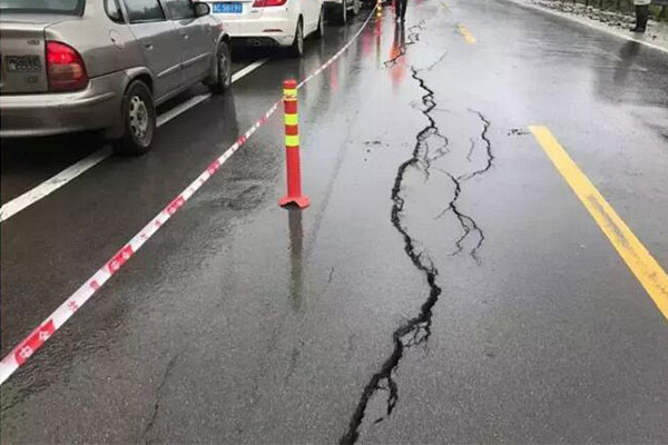 cracked road pavement