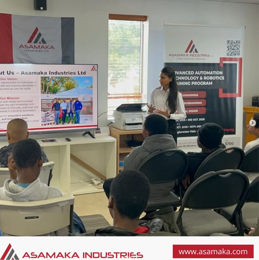 Asamaka teaching a classroom