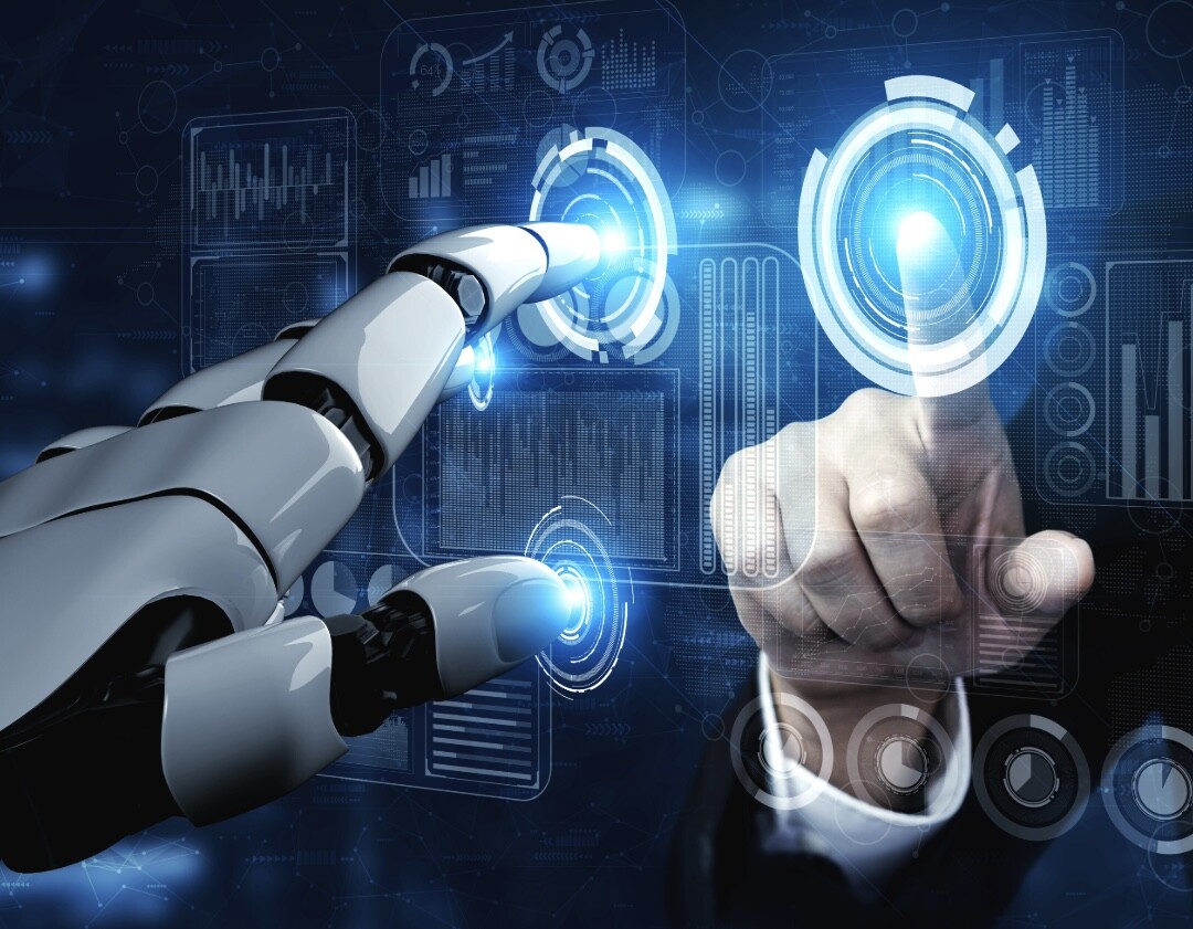 robot and human fingers touching screen