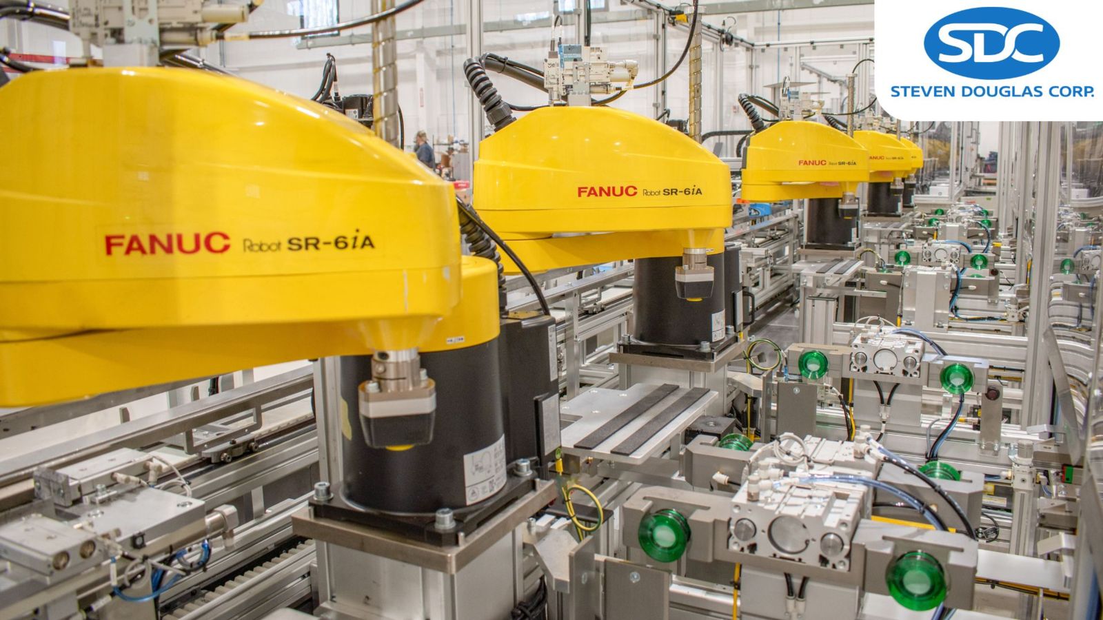 FANUC SCARA robots on an automated packaging line