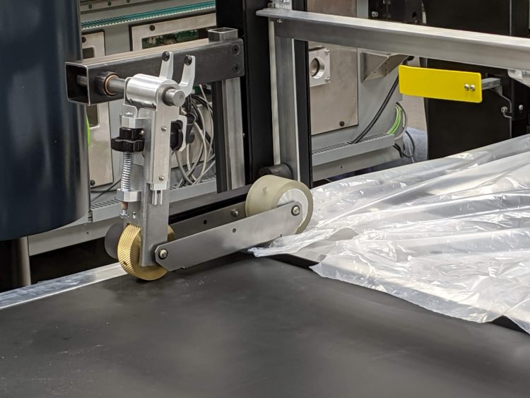 (Competitor roller with ‘tackiness’ problem unable to deliver the high coefficient of friction needed, leading to a solution that only ML6 precision polyurethane could provide.)