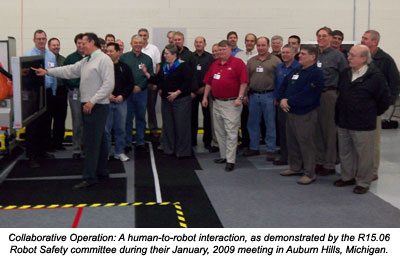 Collaborative Operation: A human-to-robot interaction, as demonstrated by the R15.06 Robot Safety committee during their January, 2009 meeting in Auburn Hills, Michigan.