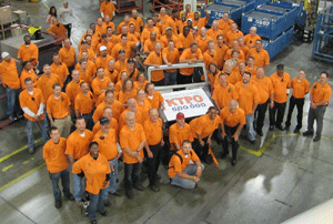 Production workers at KUKA Toledo Production Operations gather around the 500,000th Jeep Wrangler body-in-white built at the four-year-old plant in Ohio. The KTPO operation is part of Chrysler’s Toledo Supplier Park, the most productive manufacturing site for cars in North America. (Photo: KUKA Systems) 