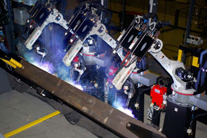 Three Robots Perform Tandem-arc, Heavy-deposition Welding on Manitowoc Cranes Outriggers