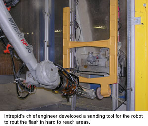 Intrepid’s chief engineer developed a sanding tool for the robot to rout the flash in hard to reach areas.