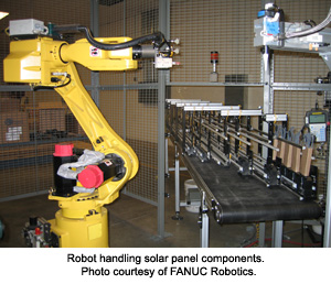 Robot handling solar panel components.   Photo courtesy of FANUC Robotics.