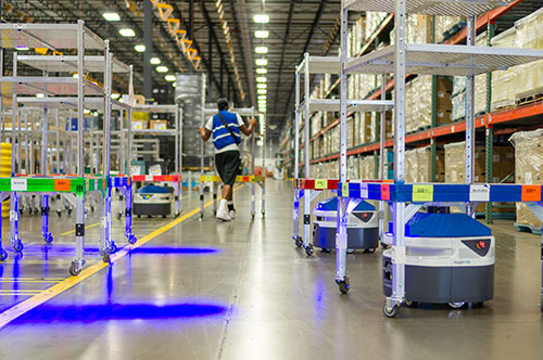 A cloud software platform efficiently manages a fleet of cart-carrying autonomous mobile robots at this third-party logistics warehouse for an automotive manufacturer. (Courtesy of Fetch Robotics, Inc.)