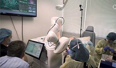 Robotic hair transplant system harvests and implants thousands of tiny hair follicles for more precise, reliable and faster minimally invasive hair restoration procedures. (Courtesy of KUKA Robotics Corporation)
