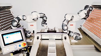 Two dual-arm collaborative robots work tirelessly together kitting and bagging hundreds of small promotional items. (Courtesy House of Design)