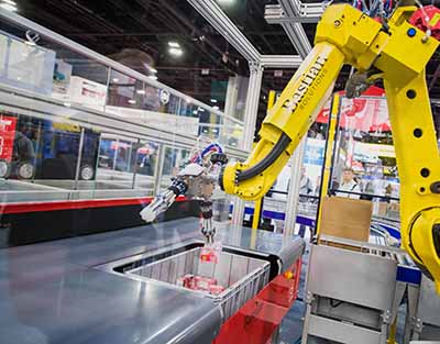 Goods-to-robot bin picking system reduces labor costs, increases throughput and minimizes human touchpoints, a potential for infectious disease spread. (Courtesy of Bastian Solutions)