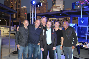 : Erwin Wieckowski, Bosch Rexroth, VP Factory Automation (center) with Charity Case, a local Charlotte band that books performances to raise funds for Ace & TJ’s Grin Kids.