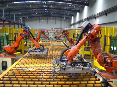 An image of fixed (hard) automation in manufacturing on the factory floor
