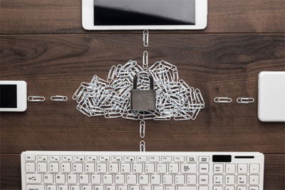 Paperclips attempting to connect technology to the locked cloud.