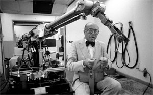 Joseph F. Engelberger in 1980, with one of his robots. His machines got a toehold in the auto industry, but he envisioned household robots that would enable more of the elderly to remain safely in their own homes. Credit Joyce Dopkeen/The New York Times