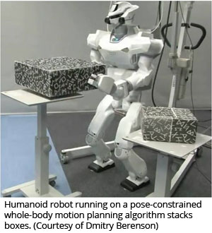 Humanoid robot running on a pose-constrained whole-body motion planning algorithm stacks boxes (Courtesy of Dmitry Berenson)