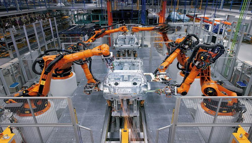 Robotic assembly line working on vehicle bodies