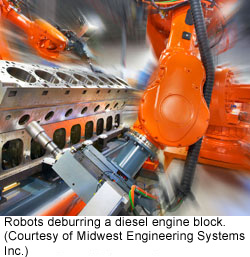 Robots deburring a diesel engine block (Courtesy of Midwest Engineering Systems Inc.)