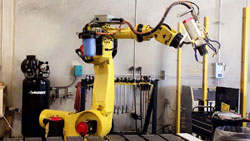  Fanuc R-2000-IA/200-FO six axis robot programmed with OCTOPUZ software 50% reduction in programming time