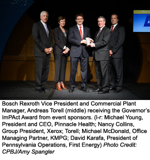 Bosch Rexroth Vice President and Commercial Plant Manager, Andreas Torell (middle) receiving the Governor’s ImPAct Award from event sponsors. (l-r: Michael Young, President and CEO, Pinnacle Health; Nancy Collins, Group President, Xerox; Torell; Michael McDonald, Office Managing Partner, KMPG; David Karafa, President of Pennsylvania Operations, First Energy) Photo Credit: CPBJ/Amy Spangler